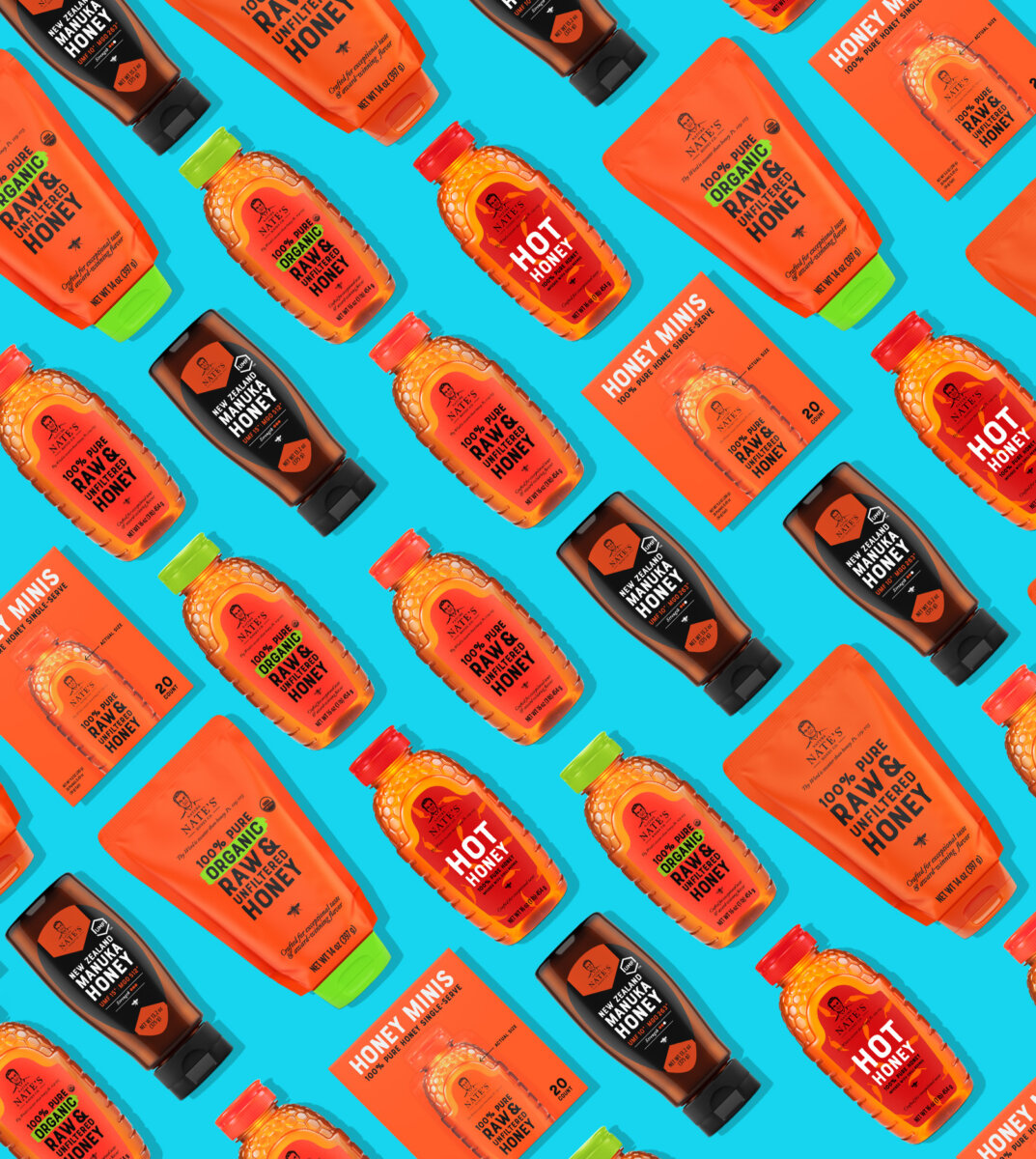 Pattern of assorted Nate's honey products on a blue background.