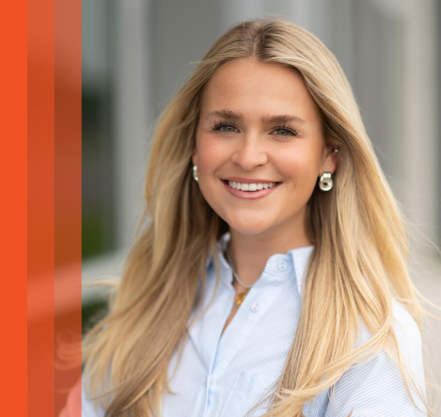 Kate headshot with orange bars.