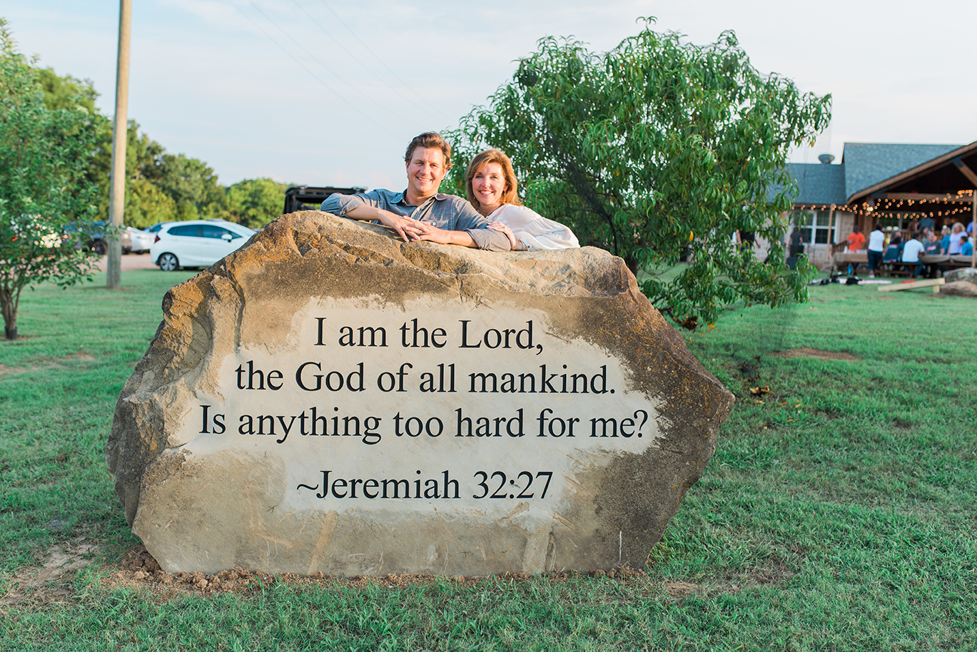 Two people behind a rock inscribed with a biblical verse_ I am the Lord, the God of all mankind. Is anything too hard for me? from Jeremiah 32:27. Two people behind a rock inscribed with a biblical verse_
I am the Lord, the God of all mankind. Is anything too hard for me?
from Jeremiah 32:27.