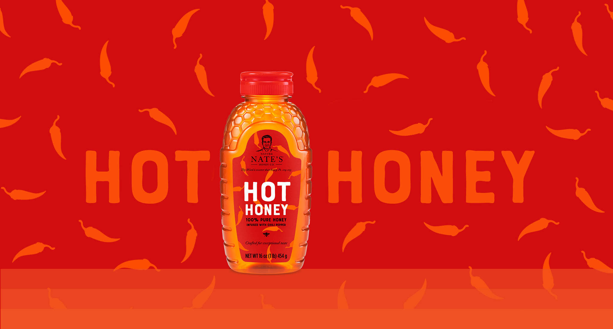 Nate's Hot Honey bottle against a red background with chili illustrations.